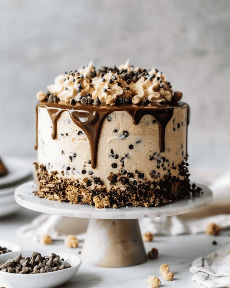 Elegant Chocolate Cake with Creamy Frosting and Caramel Drips.