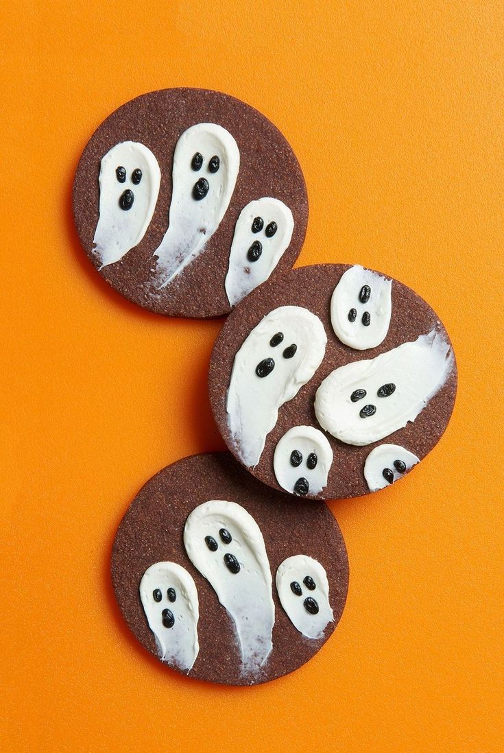 Whimsical Halloween Ghost Cookies: Rich Chocolate Base with Adorable White Frosting