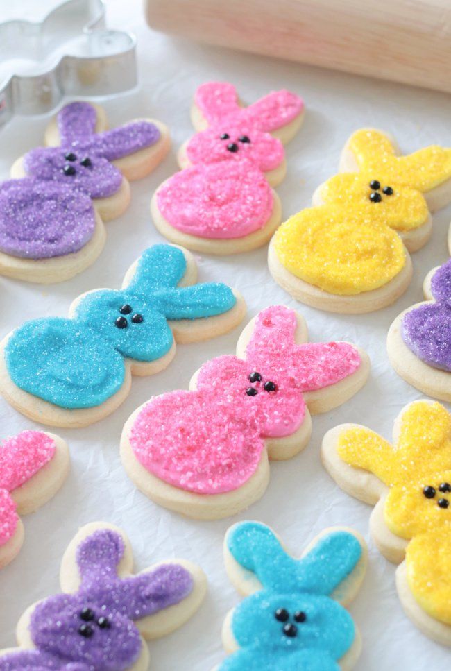 Vibrant Bunny-Shaped Cookies Adorned with Colorful Sprinkles and Icing Eyes.