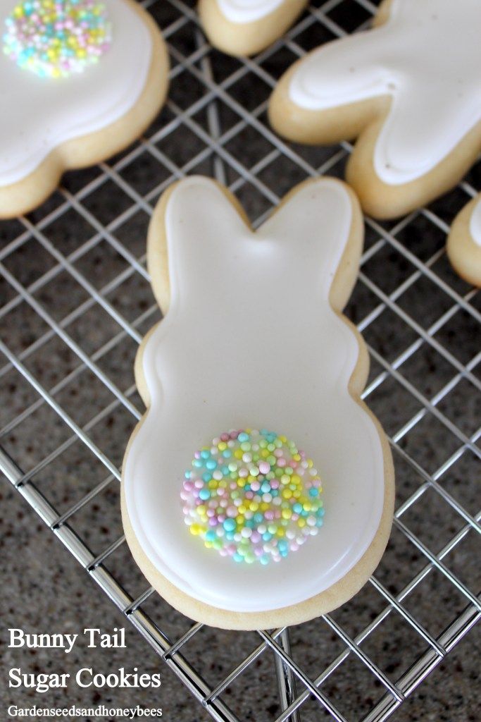 Whimsical Bunny-Shaped Sugar Cookies with Soft Icing and Sprinkle Tails