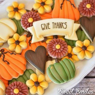 Vibrant Autumn Cookie Platter Showcasing Pumpkin and Sunflower Designs