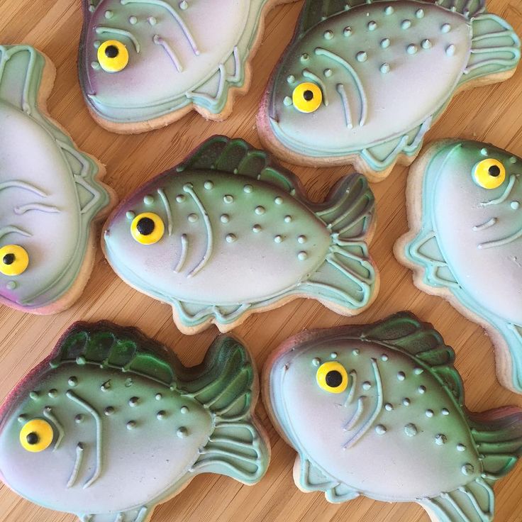 Whimsical Fish-Shaped Cookies in Soft Pastels with Cheerful Yellow Eyes