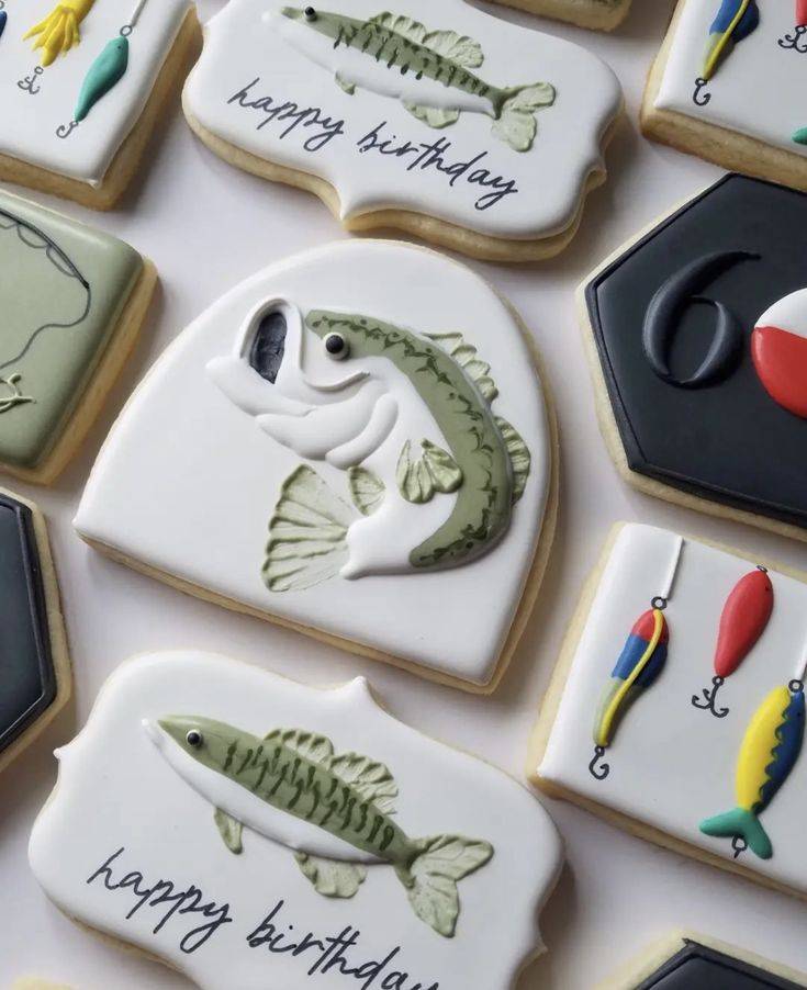 Fishing-Themed Decorated Cookies: A Playful Yet Sophisticated Birthday Centerpiece.