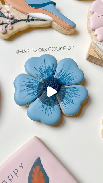 Vibrant Floral Cookie Design: Intricately Detailed Blue Flower Perfect for Spring Celebrations