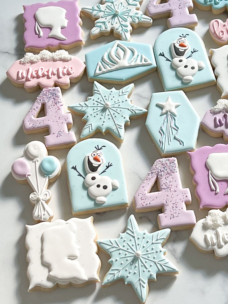 Whimsical Winter-Themed Decorated Cookies with Festive Colors and Designs