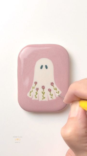 Whimsical Floral Ghost Nail Art: A Playful Seasonal Touch to Manicures.