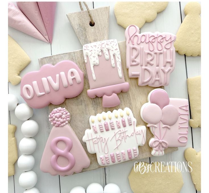 Charming Pink and White Decorative Cookies Perfect for Celebrations.