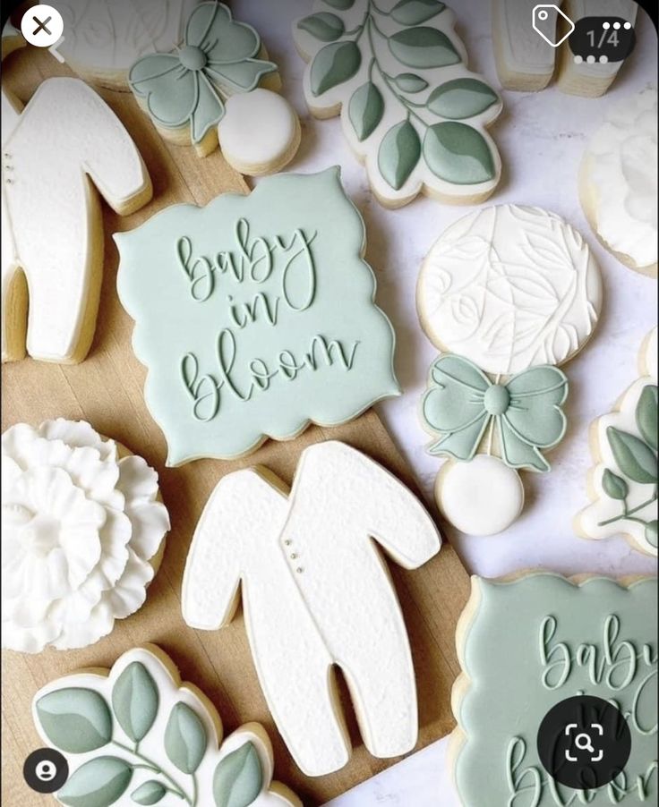 Charming Pastel Baby-Themed Cookie Designs with Elegant Details for Celebrations.