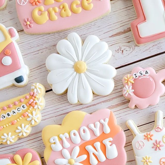 Vibrant Colorful Cookie Designs with Playful Shapes and Cheerful Floral Accents Enhance Festive Celebrations.