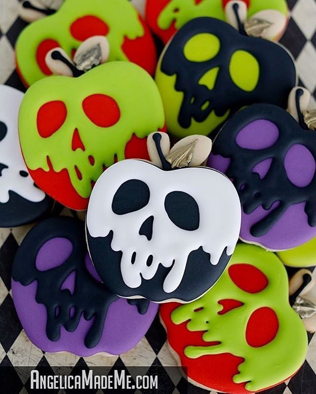 Vibrant Skull-Themed Apple Designs for Edgy Halloween Nail Art.