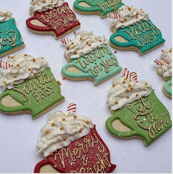 Festive Holiday Mug-Shaped Cookies Adorned with Icing and Candy Canes.