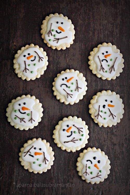 Festive Whimsical Snowman Cookies with Charming Decor and Delightful Details