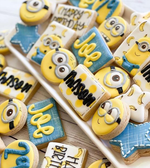 Playful Minion-Inspired Cookie Designs Spark Festive Nail Art Creativity.