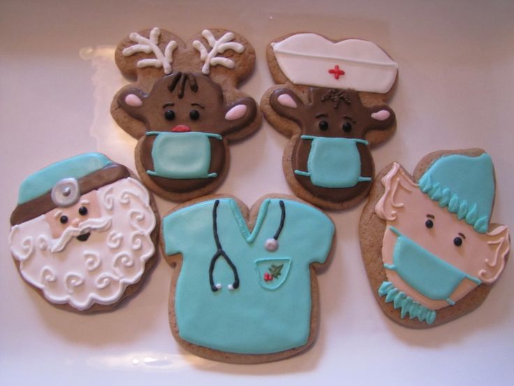 Cheerful Holiday Cookies Featuring Festive Characters in Whimsical Designs.