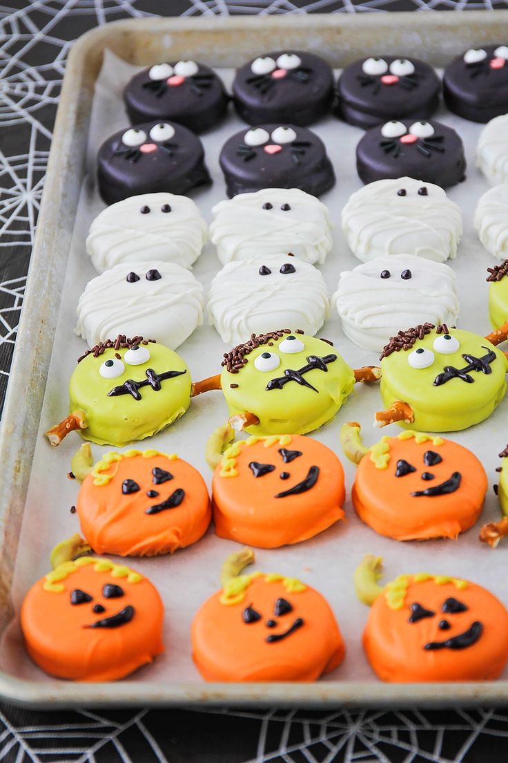 Festive and Whimsical Halloween Treats: Decorated Cookies with Playful Designs