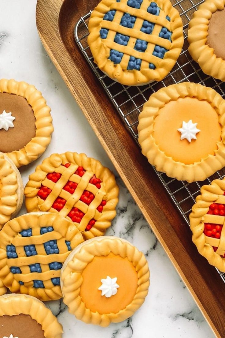 Vibrant Pie-Inspired Cookie Designs with Intricate Patterns for Festive Celebrations.