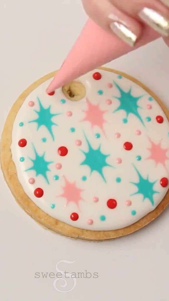 Festive and Playful Colorful Cookie Design with Vibrant Stars and Dots in Pastel Hues.