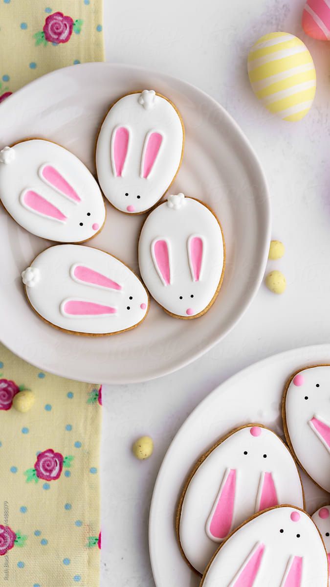 Festive Bunny-Shaped Cookies: Adorable Treats with White Icing and Pink Accents for Spring Celebrations.