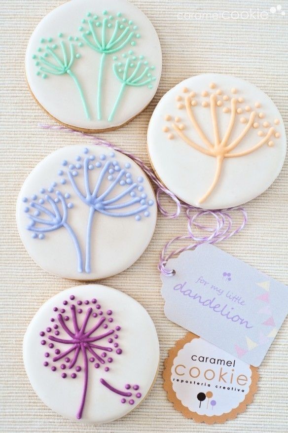 Whimsical Dandelion-Inspired Cookies and Nail Design Ideas in Pastel Colors for Spring Celebrations.