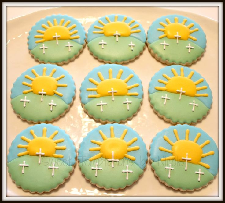 Cheerful Colorful Cookies with Sun and Cross Design Perfect for Celebrations.