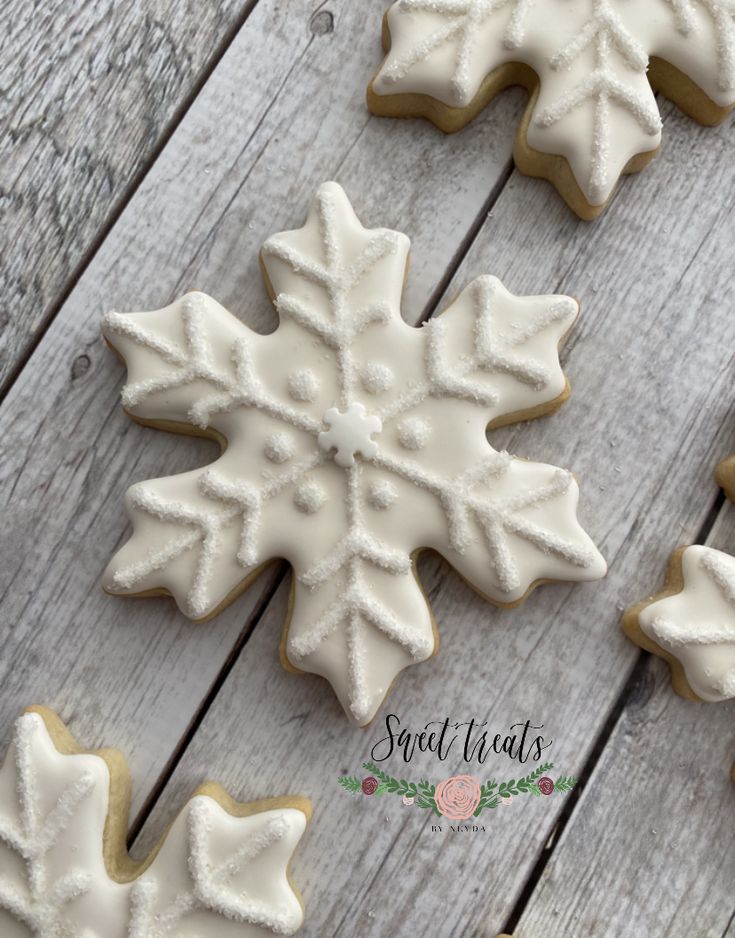 Delicate Snowflake Cookies Inspire Elegant Winter Nail Art.