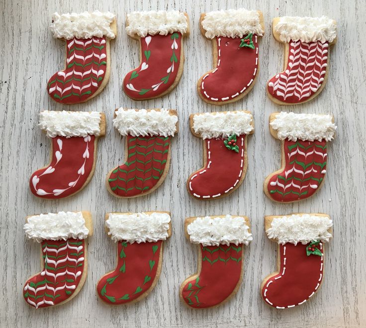 Festive Decorative Christmas Stocking Cookies with Unique Frosted Designs.