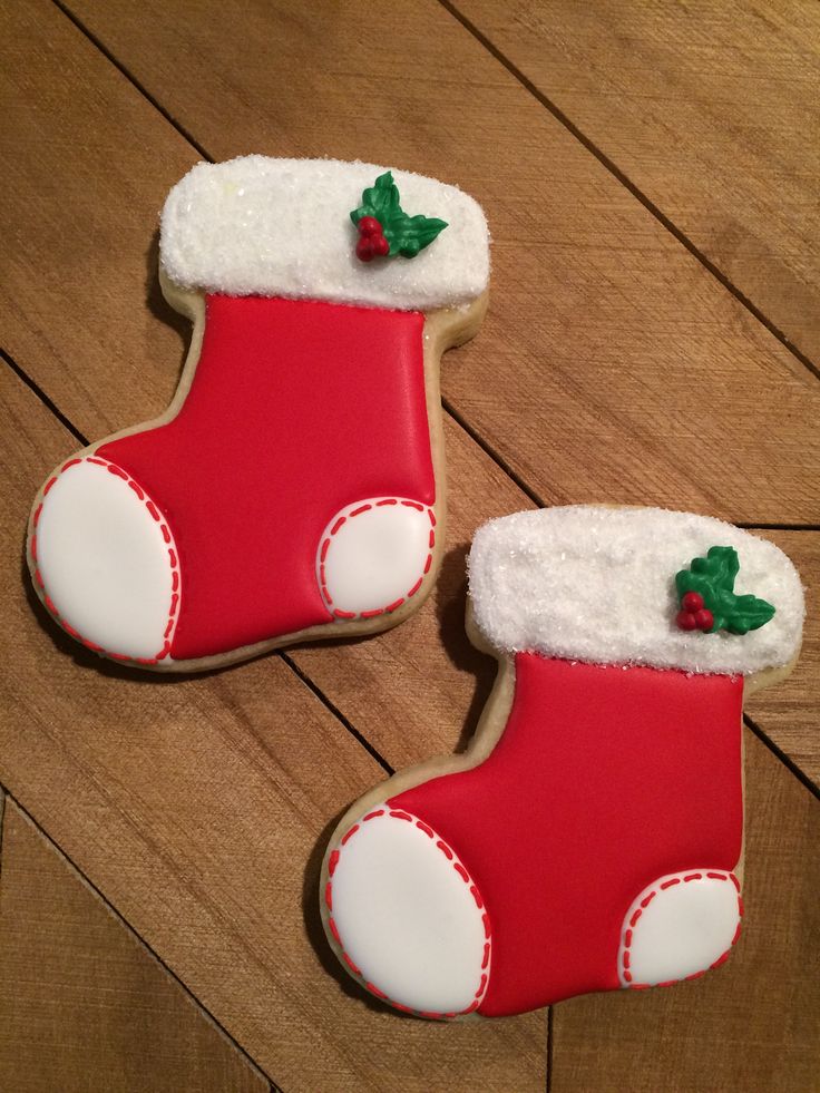 Cheerful Festive Cookies Decorated Like Christmas Stockings with Holly Accents.