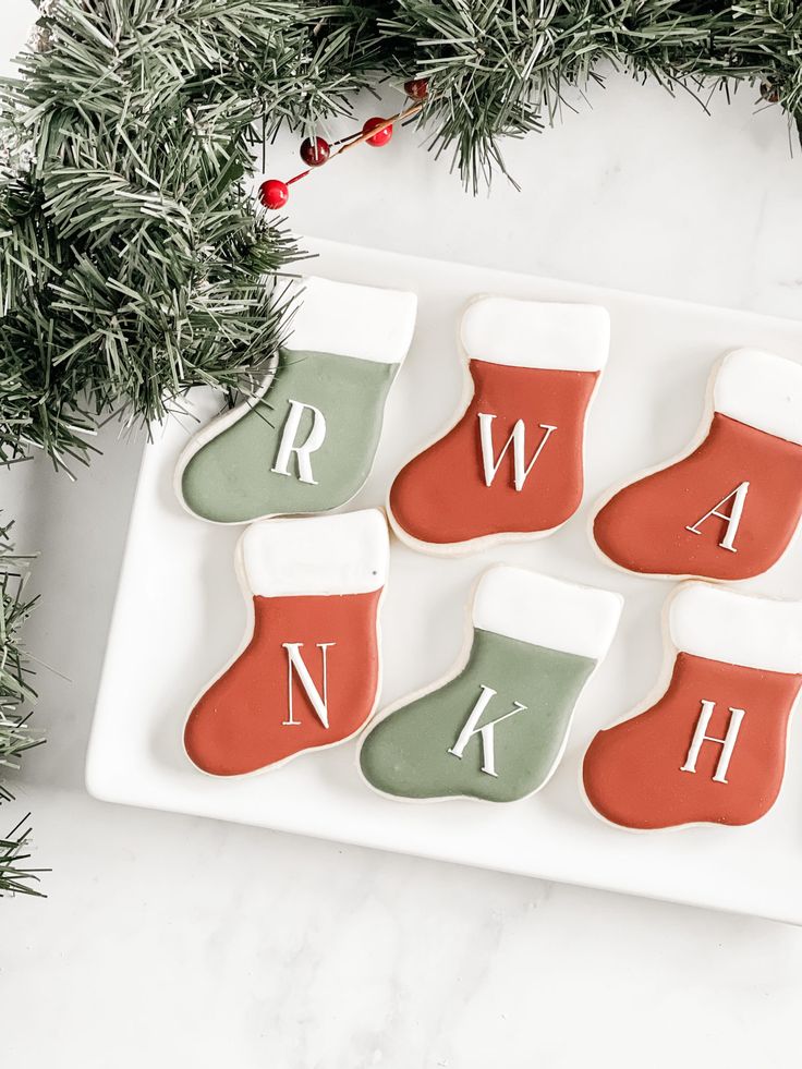 Cheerful Festive Cookie Display with Iced Stockings and Green Garland