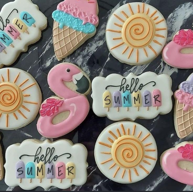 Vibrant Summer-Themed Cookies Featuring Playful Flamingos, Cheerful Suns, and Ice Cream Motifs in Pastel Colors.