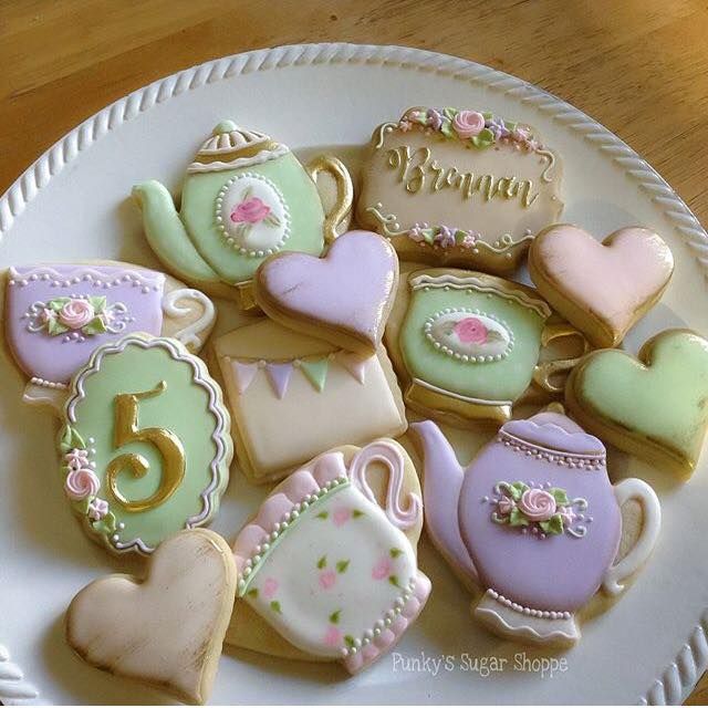 Elegant Tea Party-Inspired Decorative Cookies in Soft Pastels with Floral Accents.