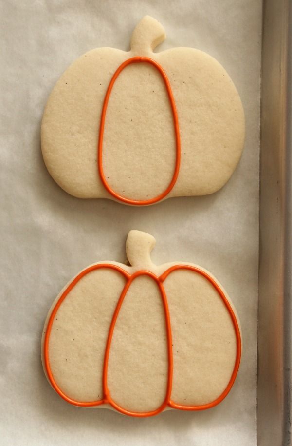 Festive Pumpkin-Shaped Cookies Ready for Creative Decoration