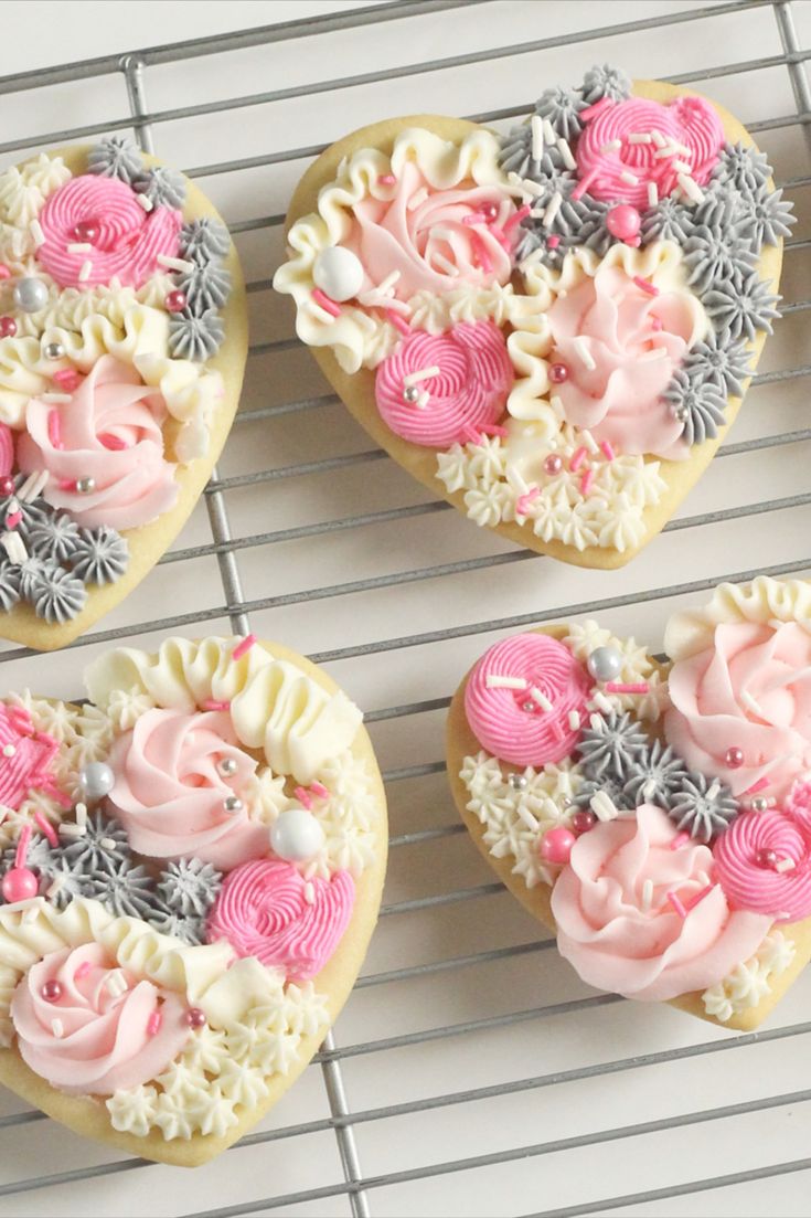 Elegant Heart-Shaped Cookies Decorated with Pastel Floral Icing for Celebrations