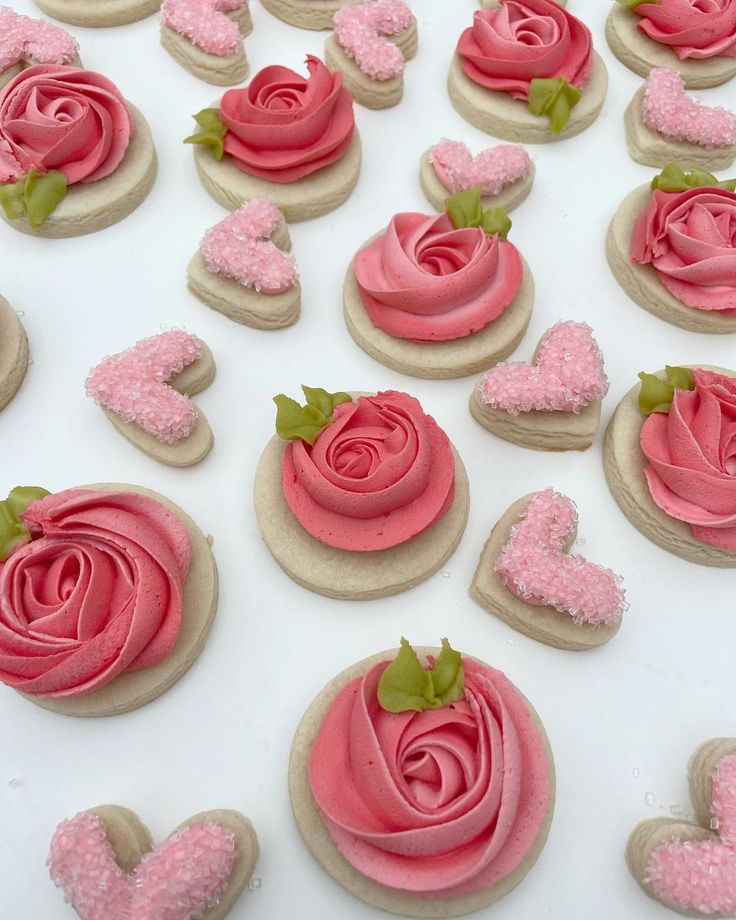 Charming Floral Cookie Designs with Intricate Pink Roses and Sugary Hearts