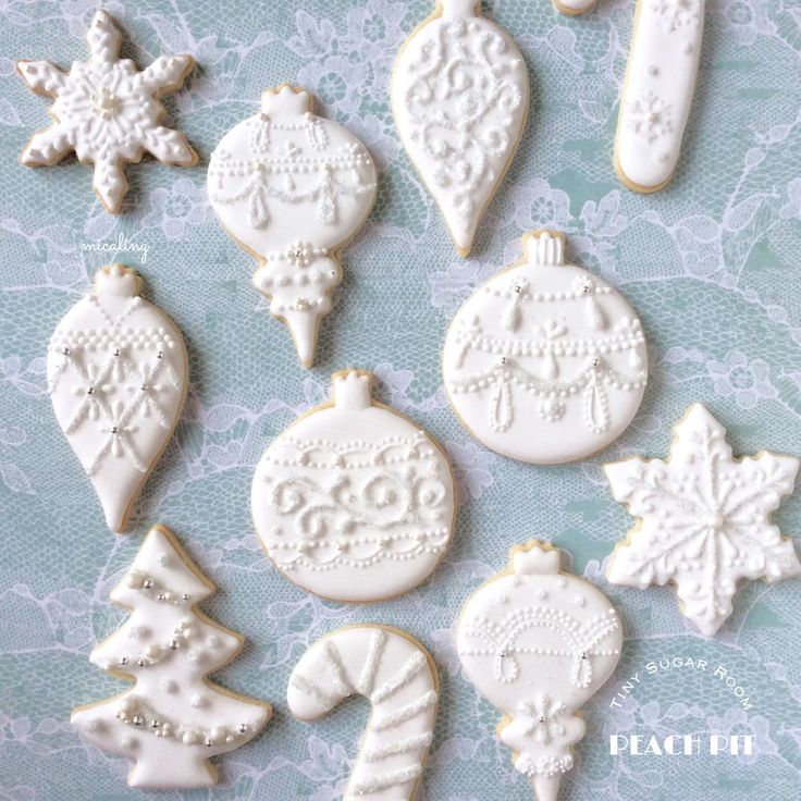 Elegant Winter-Themed Decorative Sugar Cookies with Intricate Designs.