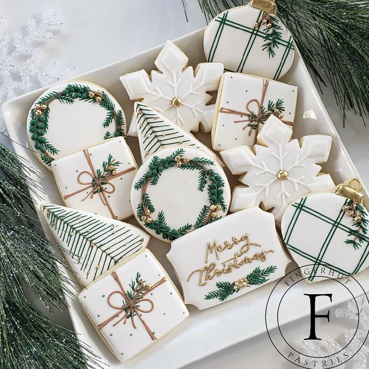 Festively Decorated Winter Holiday Cookies with Intricate Icing Designs.