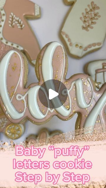 Charming Pastel Pink and White Iced Cookies with Playful Puffy Lettering and Gold Accents for Baby-Themed Celebrations.