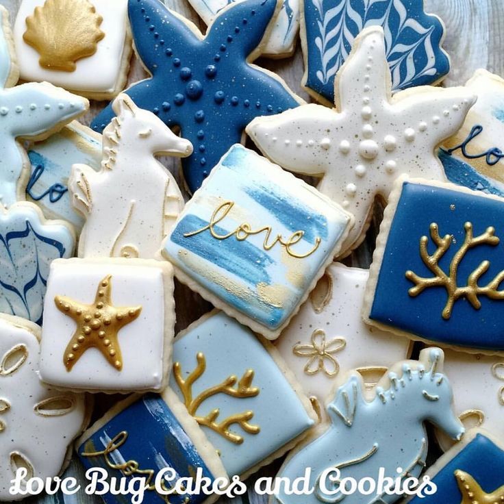 Elegant Ocean-Themed Cookies Decorated with Colorful Patterns and Gold Accents.