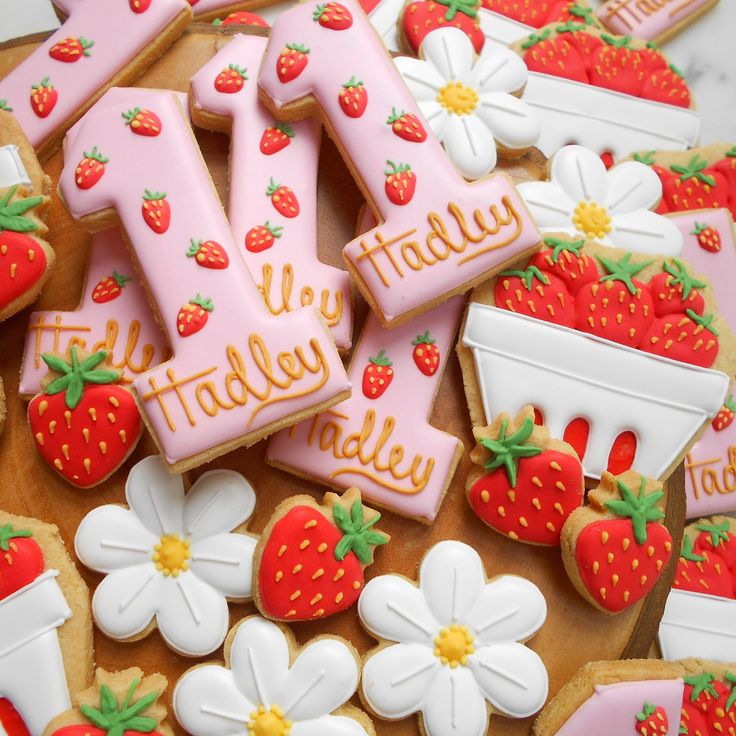 Vibrant Cookie Assortment with Strawberry and Floral Designs for Celebrations.