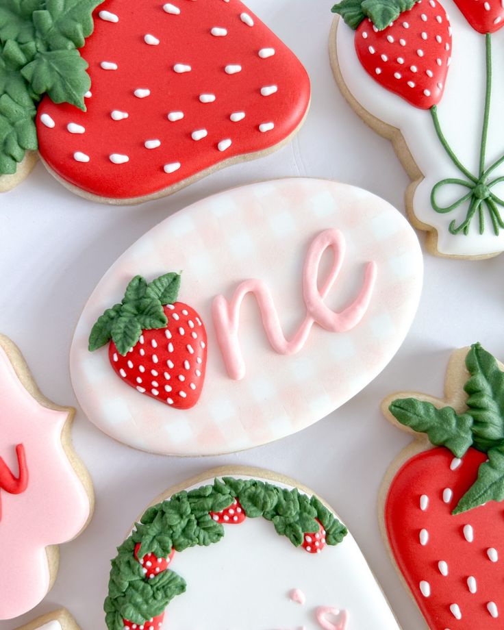 Vibrant Strawberry-Themed Cookies with Festive Designs for Celebrations