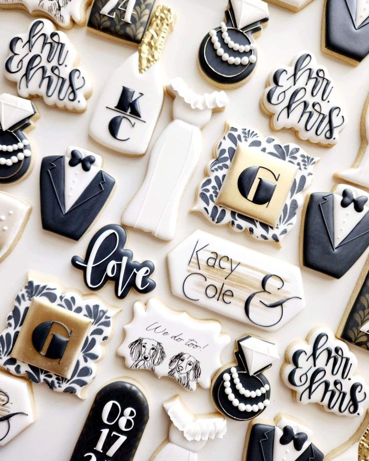 Sophisticated Wedding-Themed Cookie Designs: Elegance in Black, White, and Gold.