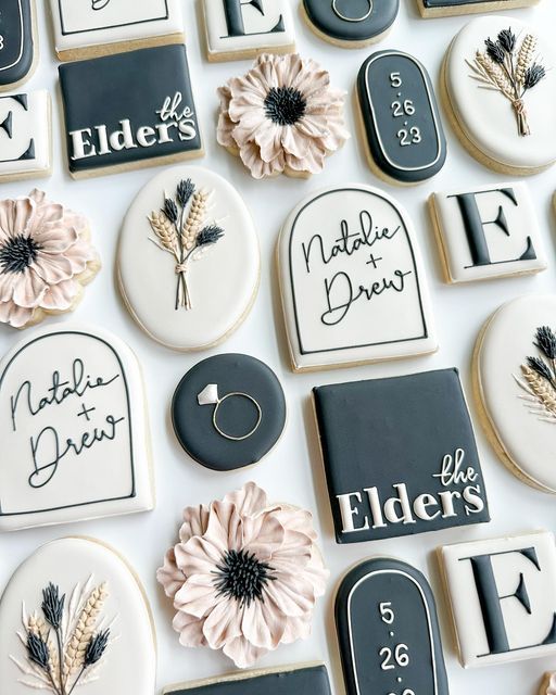 Elegant Floral Cookie Designs with Charming Script Lettering and Textured Elements.