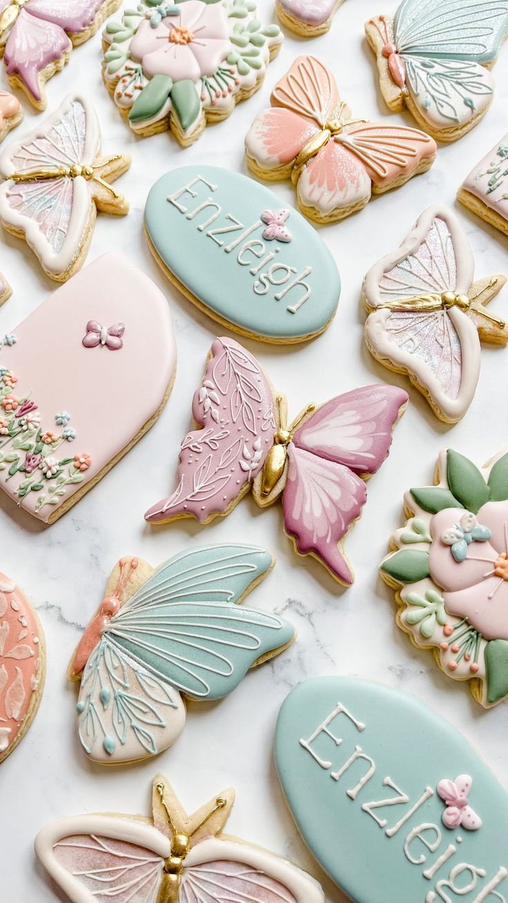 Whimsical Pastel Butterfly and Floral Designs on Elegant Treats.