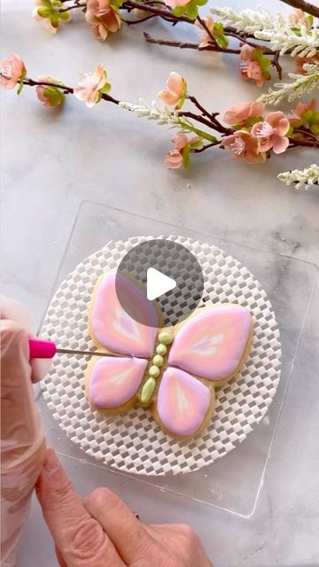 Pastel Butterfly Cookie Design: Inspiring Delicate Nail Art Aesthetics.