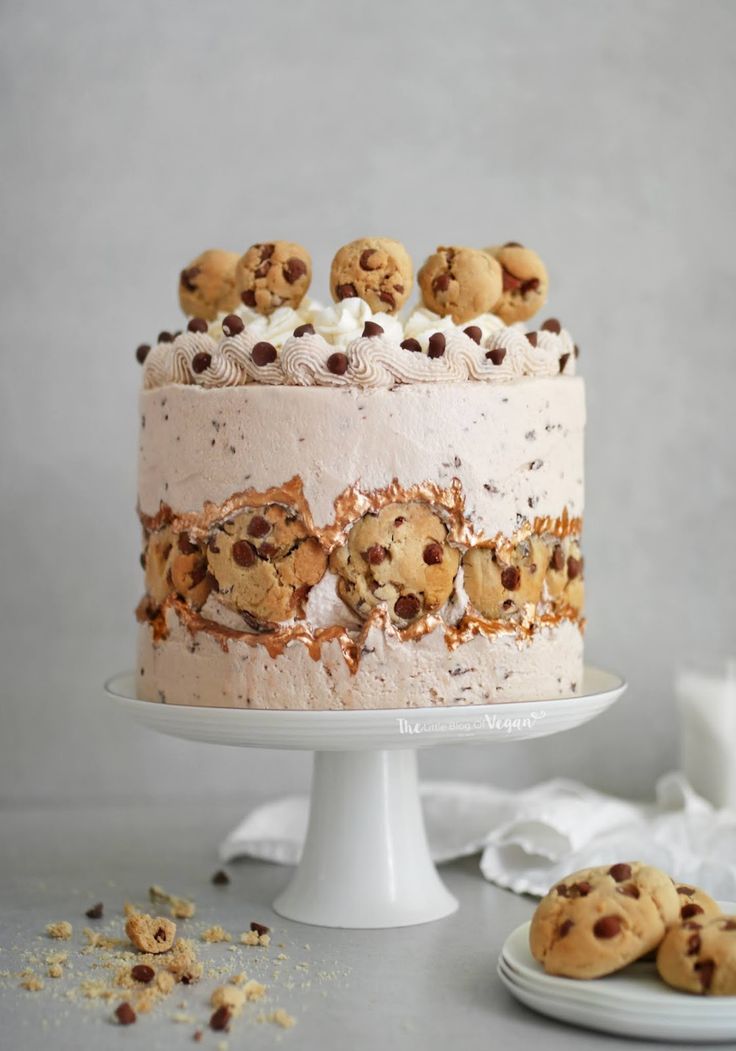 Indulgent Cookie Cake Topped with Whipped Cream and Cookie Dough Balls.