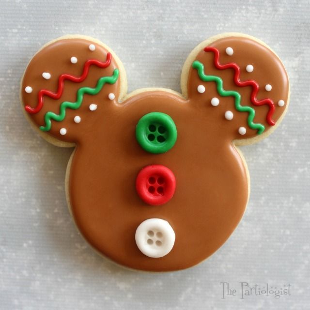 Whimsical Character-Shaped Gingerbread Cookies Decorated with Colorful Icing and Button Embellishments.