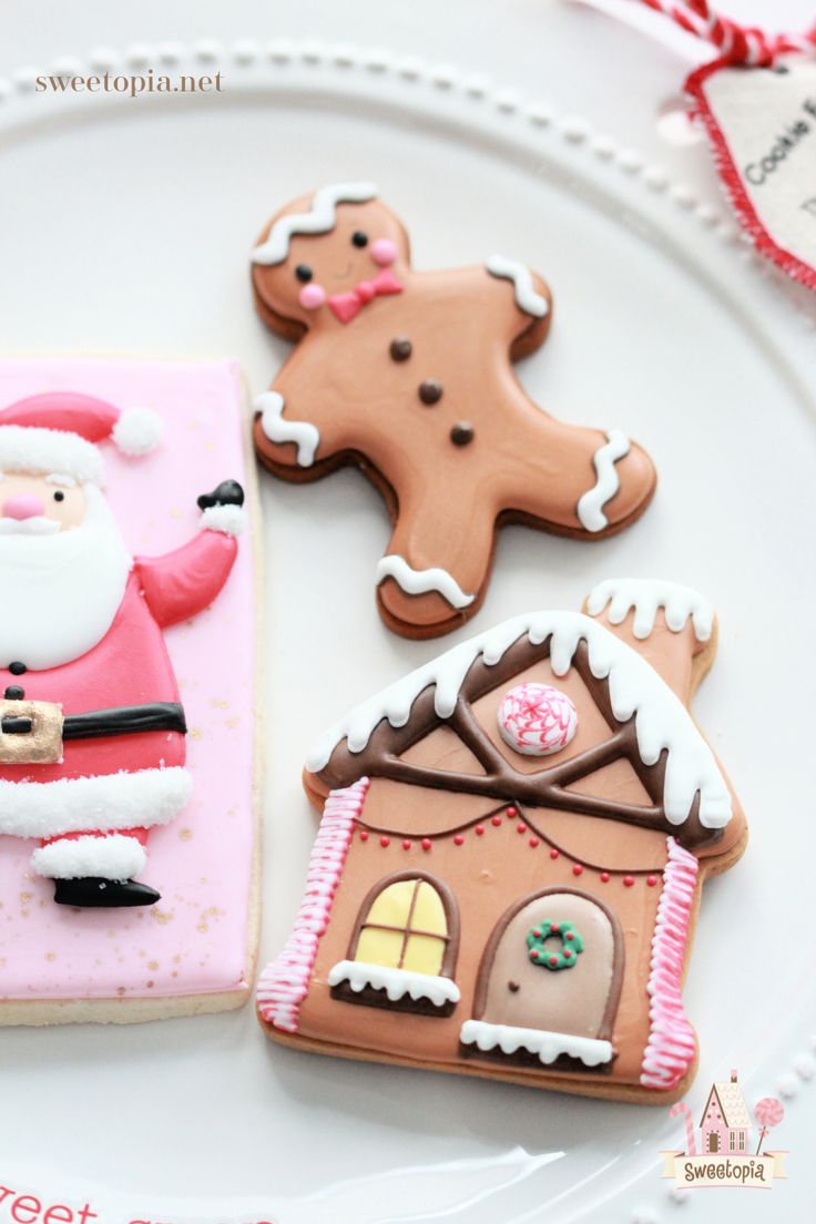 Charming Festive Cookie Designs: Gingerbread Man, House, and Jolly Santa.