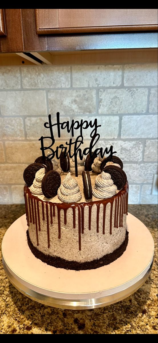 Indulgent Layered Birthday Cake with Chocolate Drips and Oreo Toppings