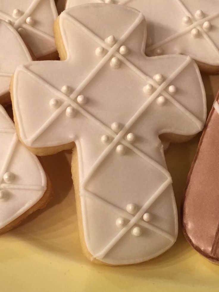 Elegant Cross-Shaped Iced Cookies Inspire Sophisticated Nail Art Design.