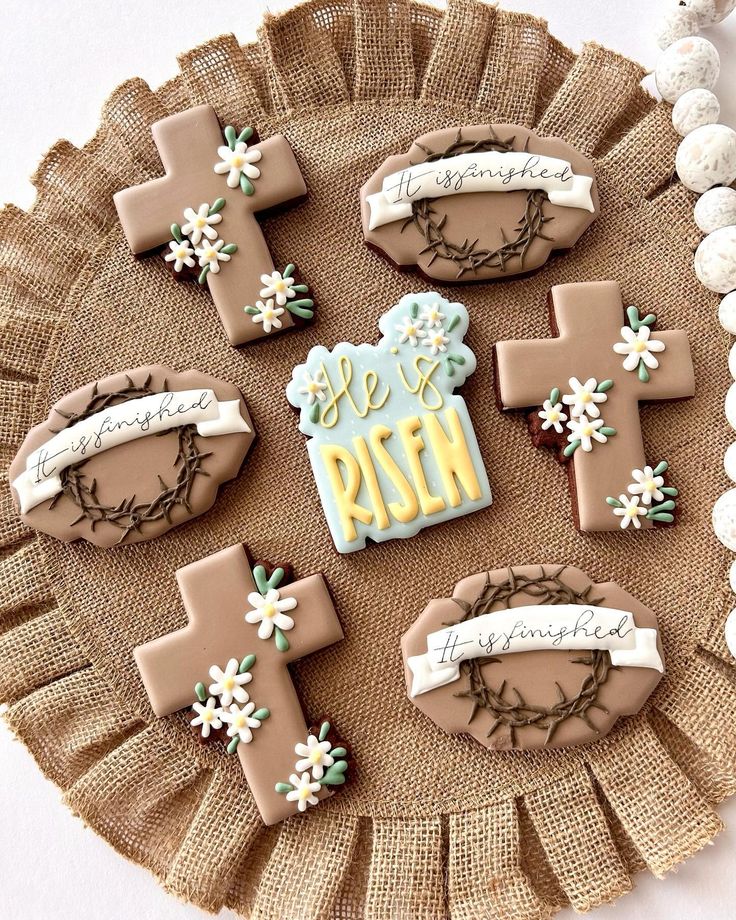 Easter Cookies with Crosses and Floral Accents in Soft Earthy Tones and Bright Hues.