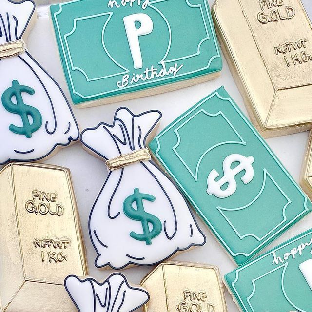 Whimsical Money-Themed Decorative Cookies in Mint Green and Gold for Birthday Celebrations.